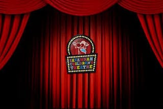 Savannah Children's Theatre colorful stage with young performers in theatrical costumes and professional lighting