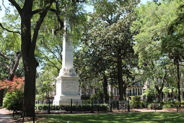 Monterey Square Mercer-Williams House literary landmark with Casimir Pulaski monument and mature oak trees